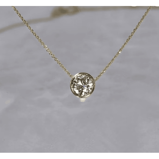 Dije en oro amarillo de 14K con Diamante natural de 5.13x5.13 