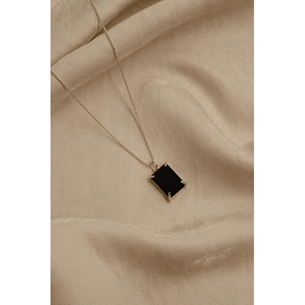 Dije en oro amarillo de 18k con ESFENO 