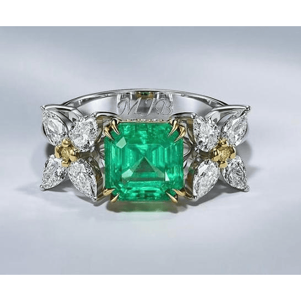 Dije en oro blanco de 14k con oro amarillo de 14k con Esmeralda corte octágono 9.4x7.7x5.5mm  con moissanitas  3.10ct 