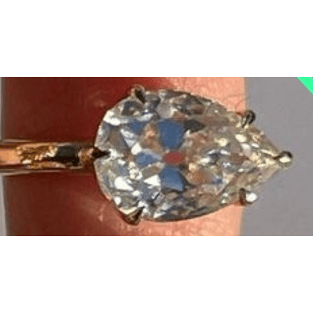 Anillo talla 7 en plata y baño de oro amarillo con un cuarzo rutilado y topacio blanco 