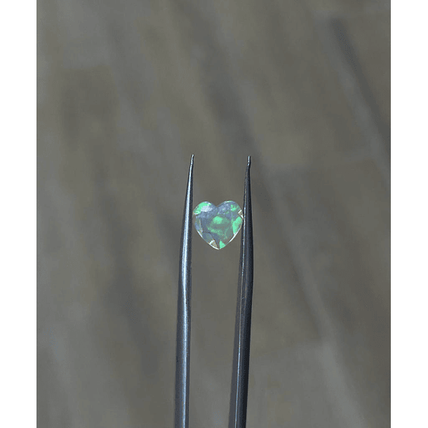 Ópalo-0.60ct-6.9x6.8mm 