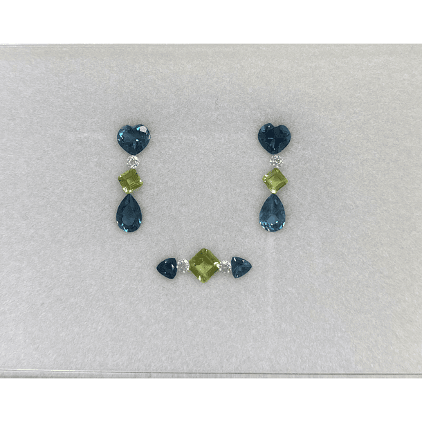 2 Topacio London Blue c/corazón 5x5mm-2 Topacio London Blue c/pera 6x3mm-2 Topacio London Blue c/trillón 3x3mm-2 Peridoto c/asscher 3x3mm-4 Moissanitas c/redondo 2mm 