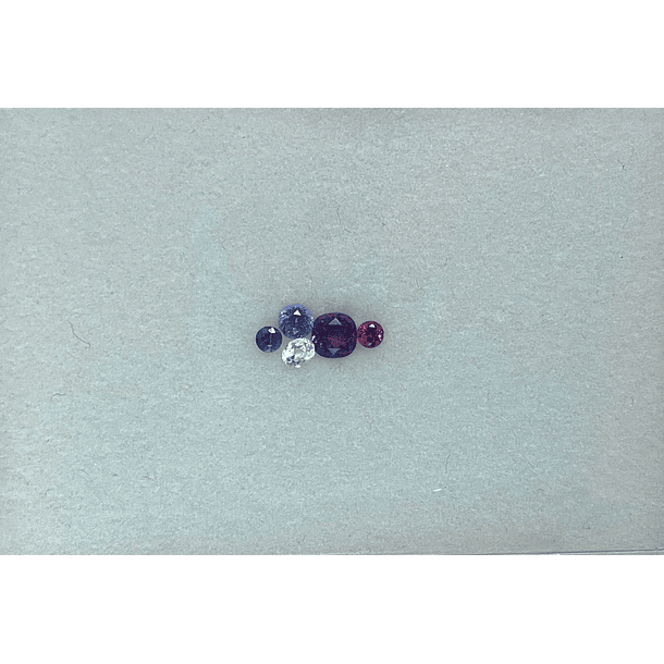 Set que incluye: Amatista c/cojín-Granate Rodolita c/redondo-Tanzanita c/redondo-Topacio Blanco-Zafiro Redondo  