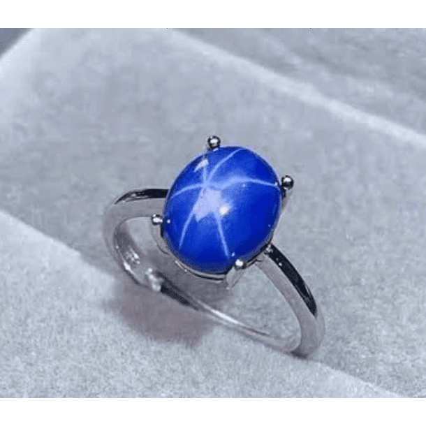 Par de anillos en plata ley.925 con baño de rodio con Zafiro estrella cabujón. Talla 6  