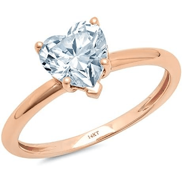 Anillo solitario con Topacio azul corte corazón en oro amarillo de 14k. Talla 5 