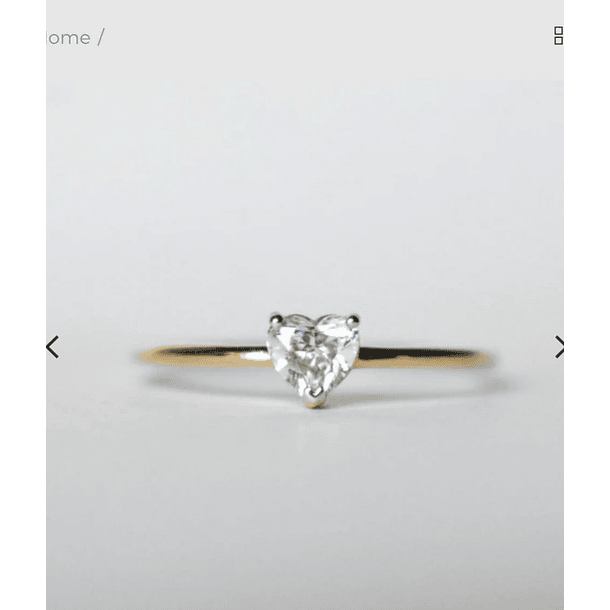 Anillo solitario en oro amarillo de 14k con moissanita corte corazón de 6x6mm. Talla 5 3/4 
