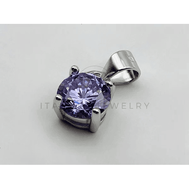 Dije solitario en oro amarillo de 10k con rubi redondo montado a canasta con 4 uñas 