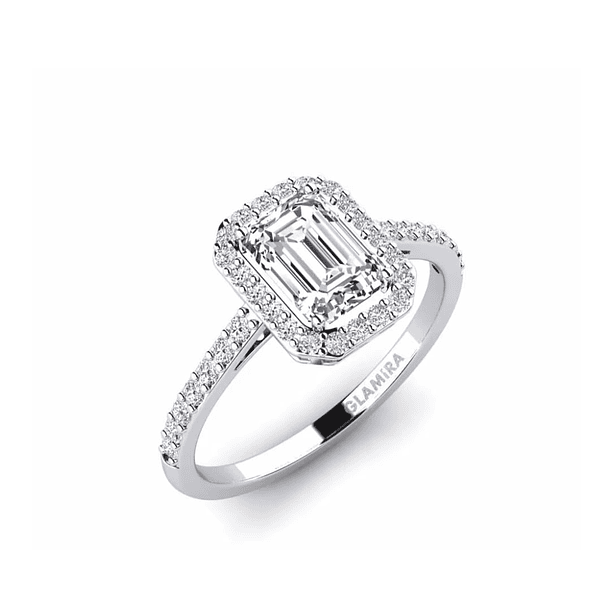 Anillo de compromiso en oro blanco con esmeralda y halo brillante de moissanitas de 1mm y por dentro 1 espinela y 1 esmeralda de 2mm. Talla 8 