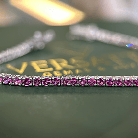 Pulsera en oro blanco de 14k con zafiro rosa 