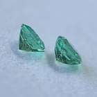 Par de esmeraldas colombianas AIG-2.04ct-6.62x6.60x4.06mm y 6.71x6.70x 3