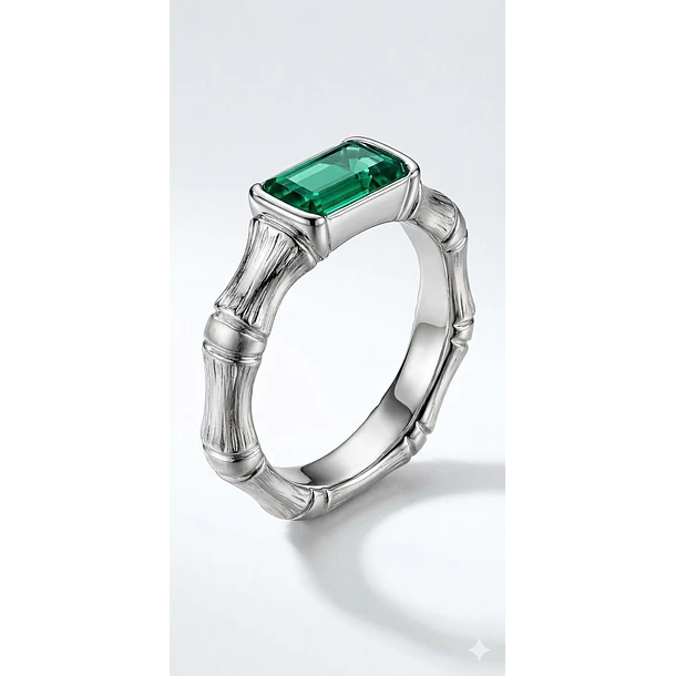 Anillo diseño de bambú en oro blanco de 14k con esmeralda corte octágono en talla 9