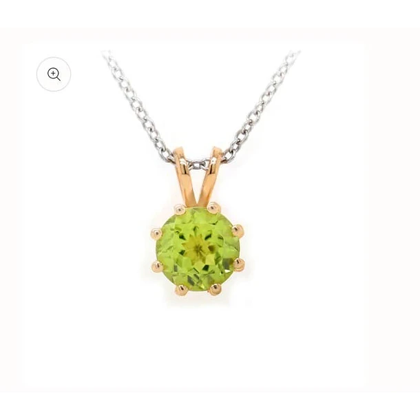 Dije doble asa en plata con baño de oro con peridoto trillón