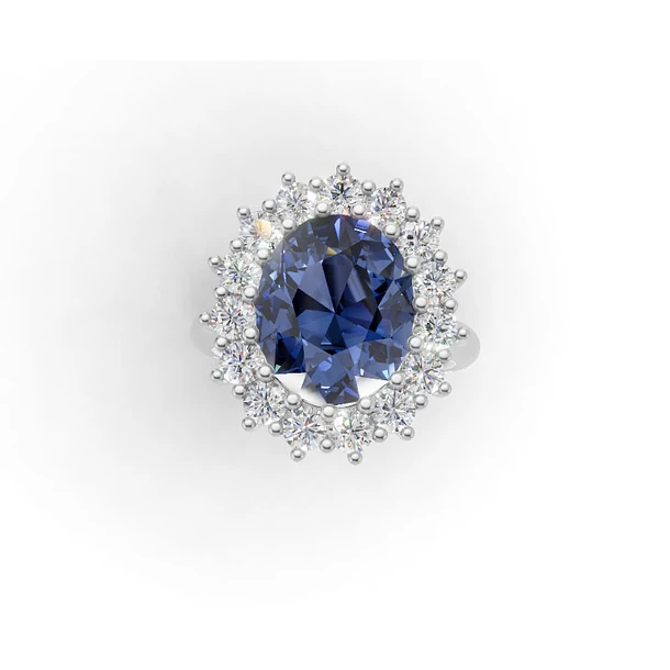 Anillo estilo lady di con zafiro oval de 8.6x6.7mm rodeado de 14 moissanitas red. De 2mm y 4 moissanitas de 2mm en cada lado de la argolla, talla 8 oro blanco de 14k
