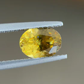 Esfeno certificado por AIG-1.41ct-7.96x6.05x4.44mm