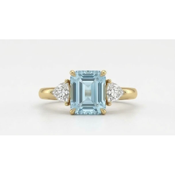 Anillo en oro de 14k con aguamarina octágono de 11.10x8.48x6.06mm y dos moissanitas corte scalene pentagon de 5x4x2.7mm en talla 10