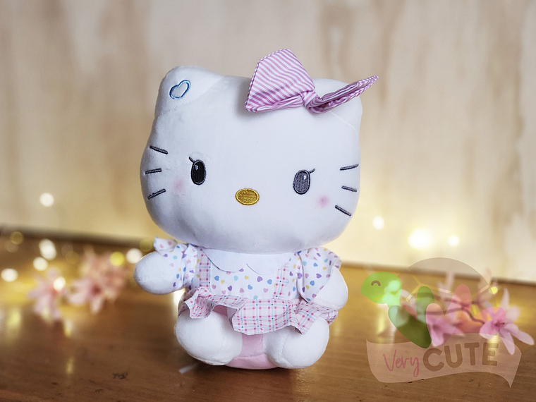  Peluche Hello Kitty con Trajes 1