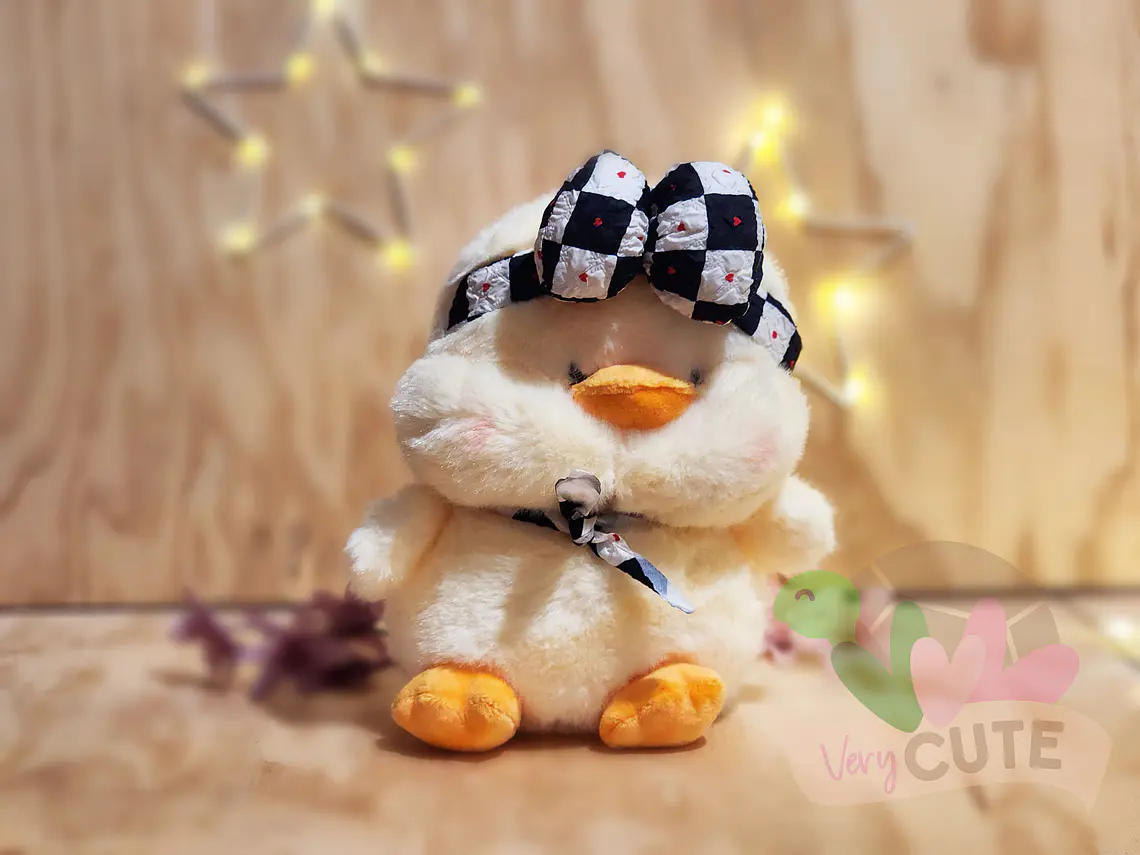 Peluche Patito con Cintillo 1