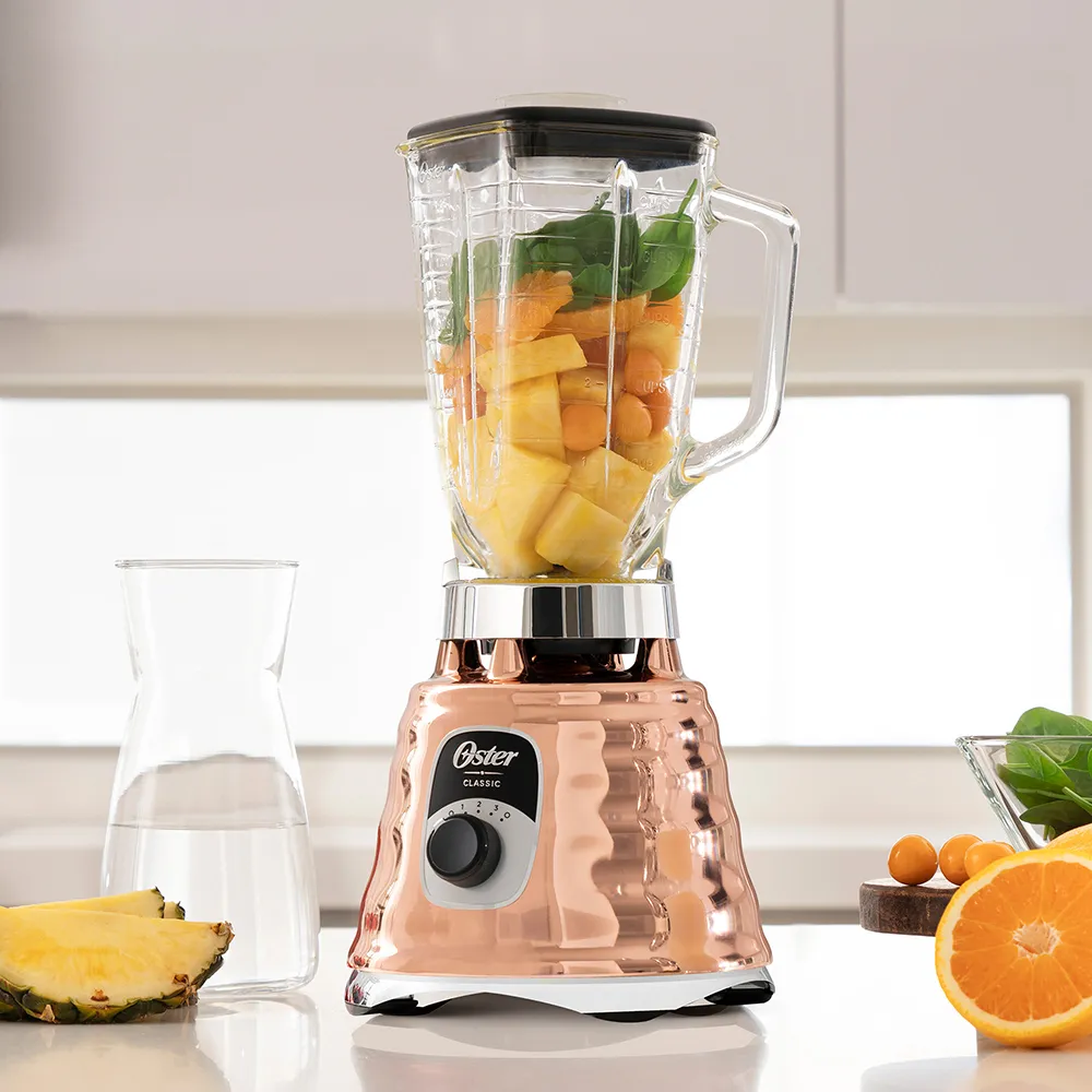 Licuadora clásica Oster® cobre con perilla ergonómica de 3 velocidades BLST4128 4