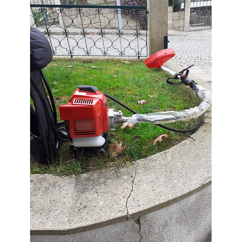 Roçadora Kawasaki TJ45 Flexível Costas Altas 11