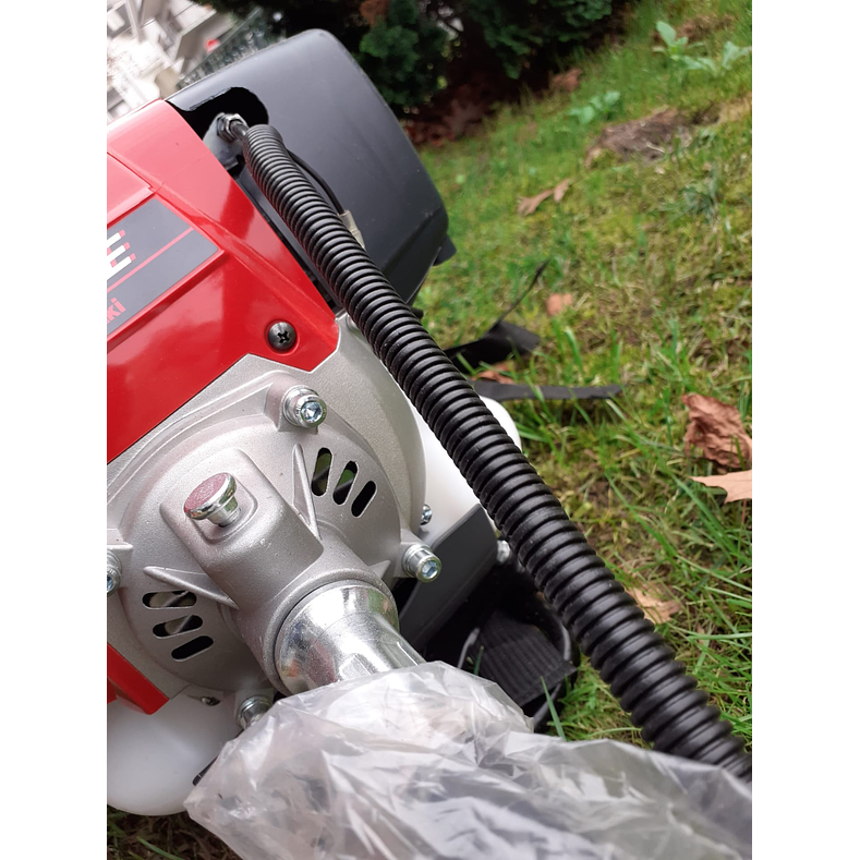 Roçadora Kawasaki TJ45 Flexível Costas Altas 12