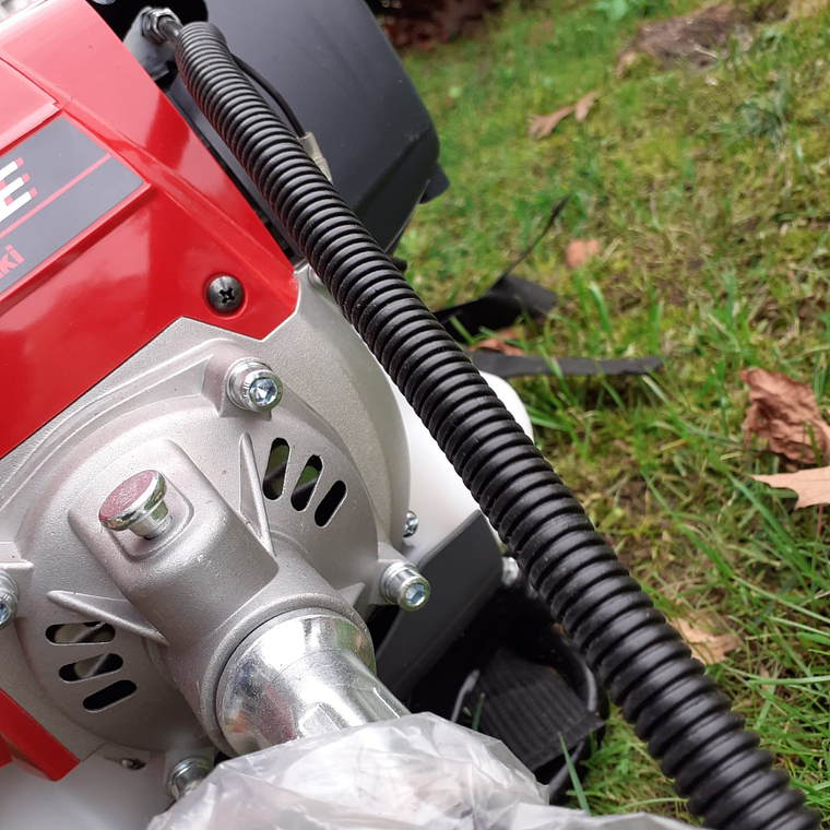 Roçadora Kawasaki TJ45 Flexível Costas Altas 12