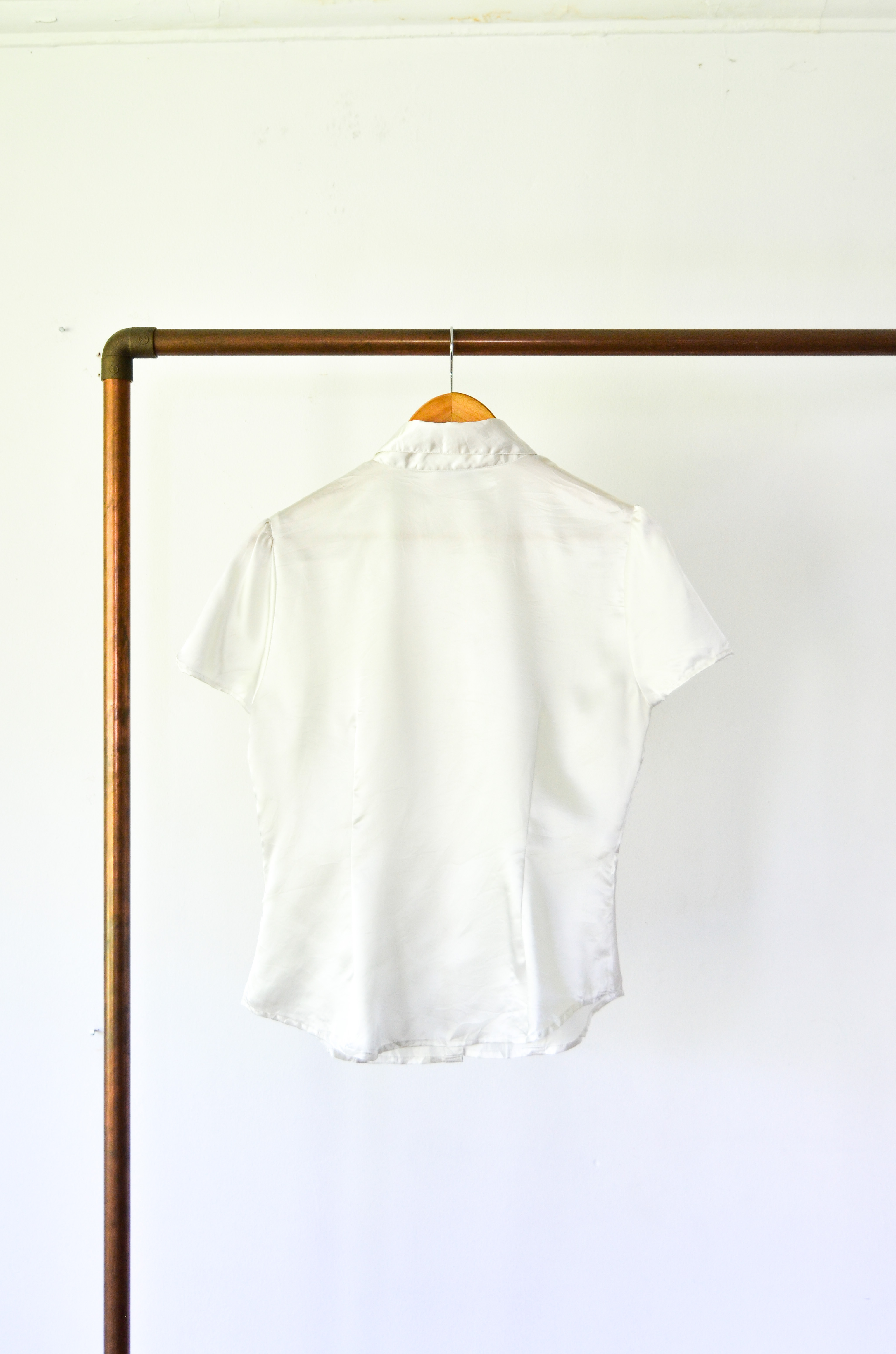 Blusa blanca satinada