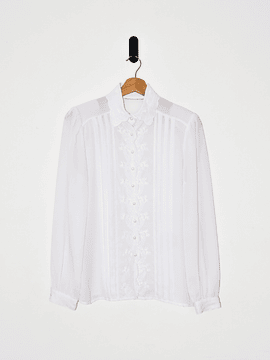 Blusa blanca romántica bordada