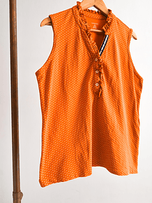 Polera naranja mini dots