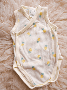 Body amarillo piñitas 3-6M