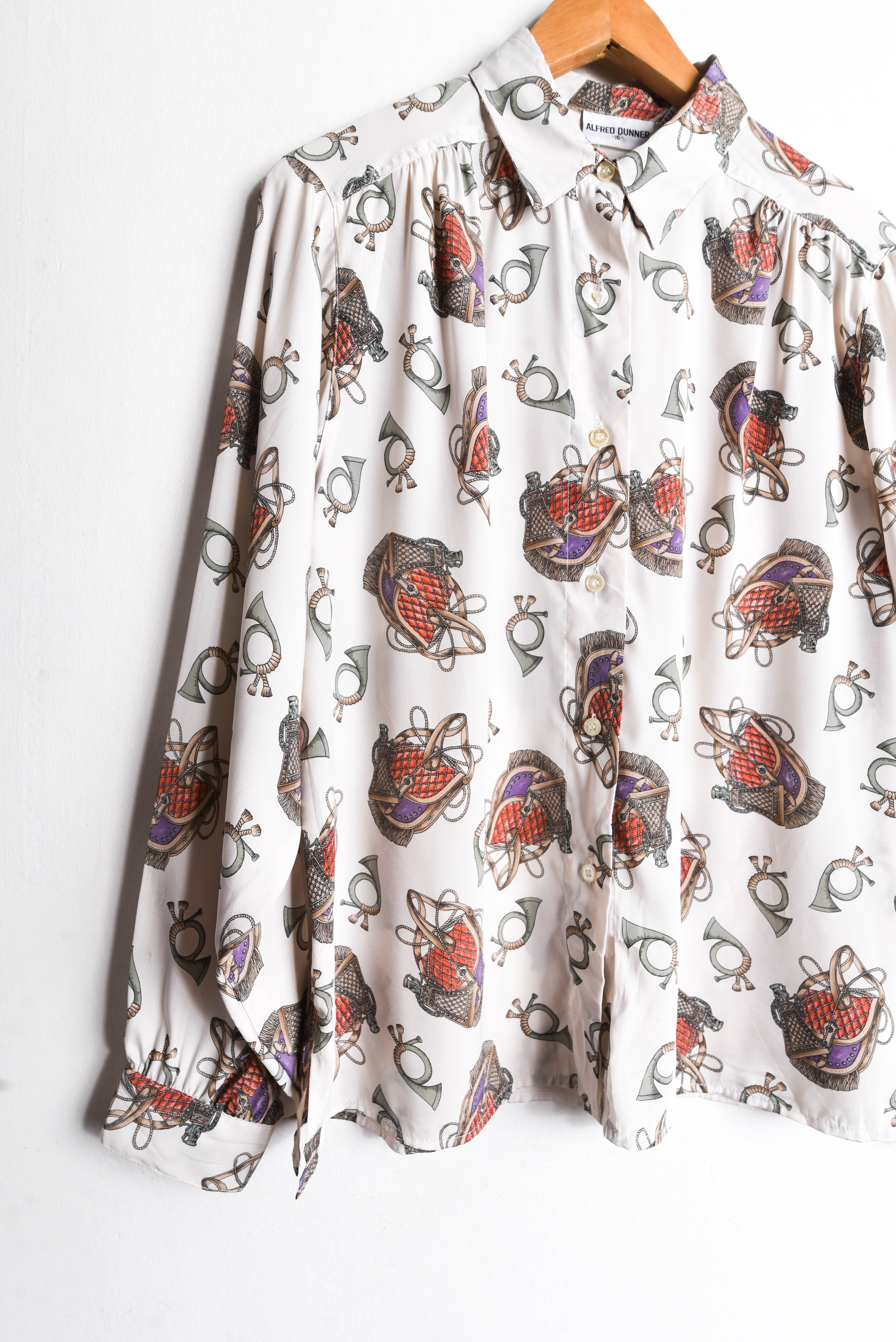 Blusa vintage print trompetas