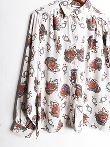 Blusa vintage print trompetas