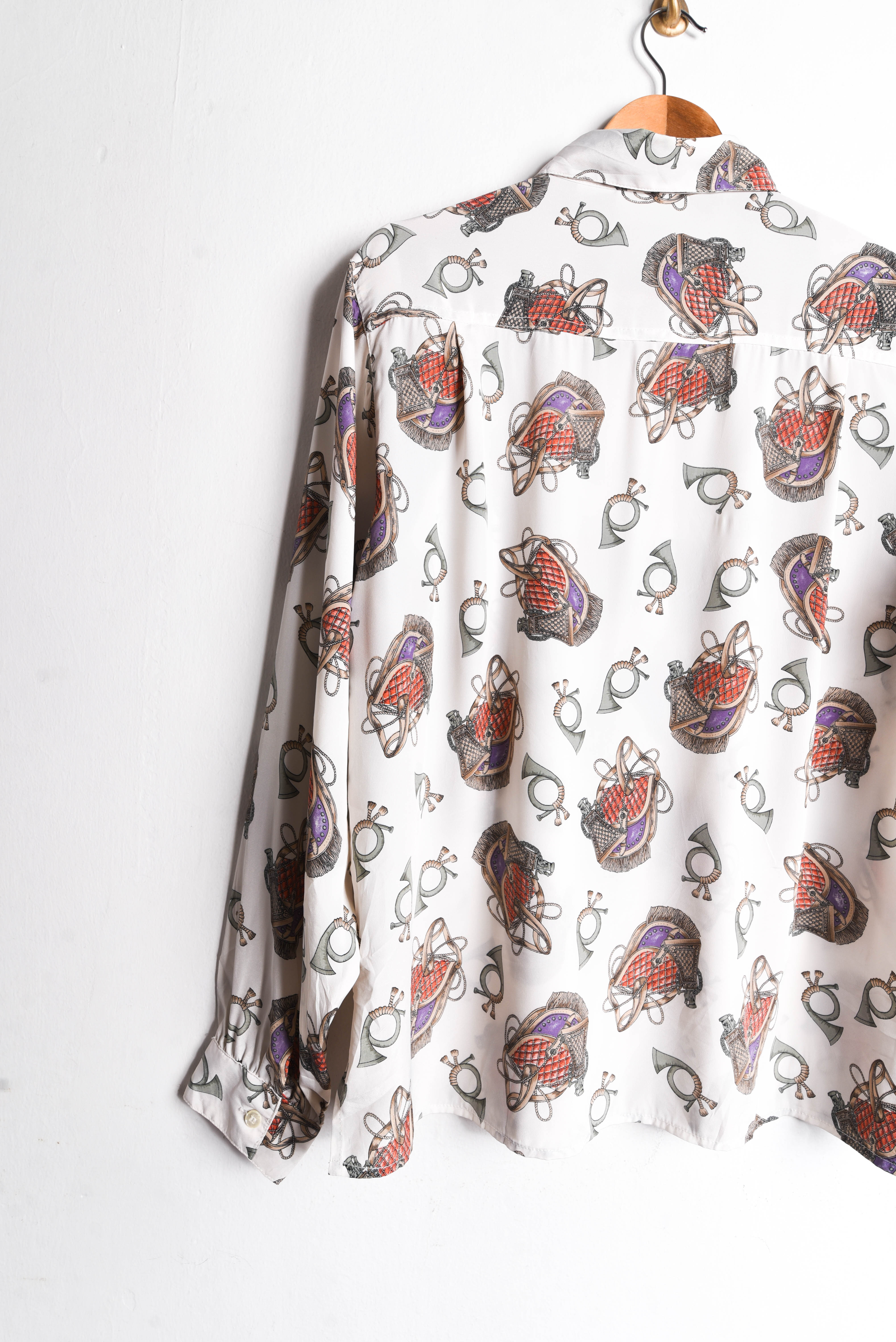 Blusa vintage print trompetas