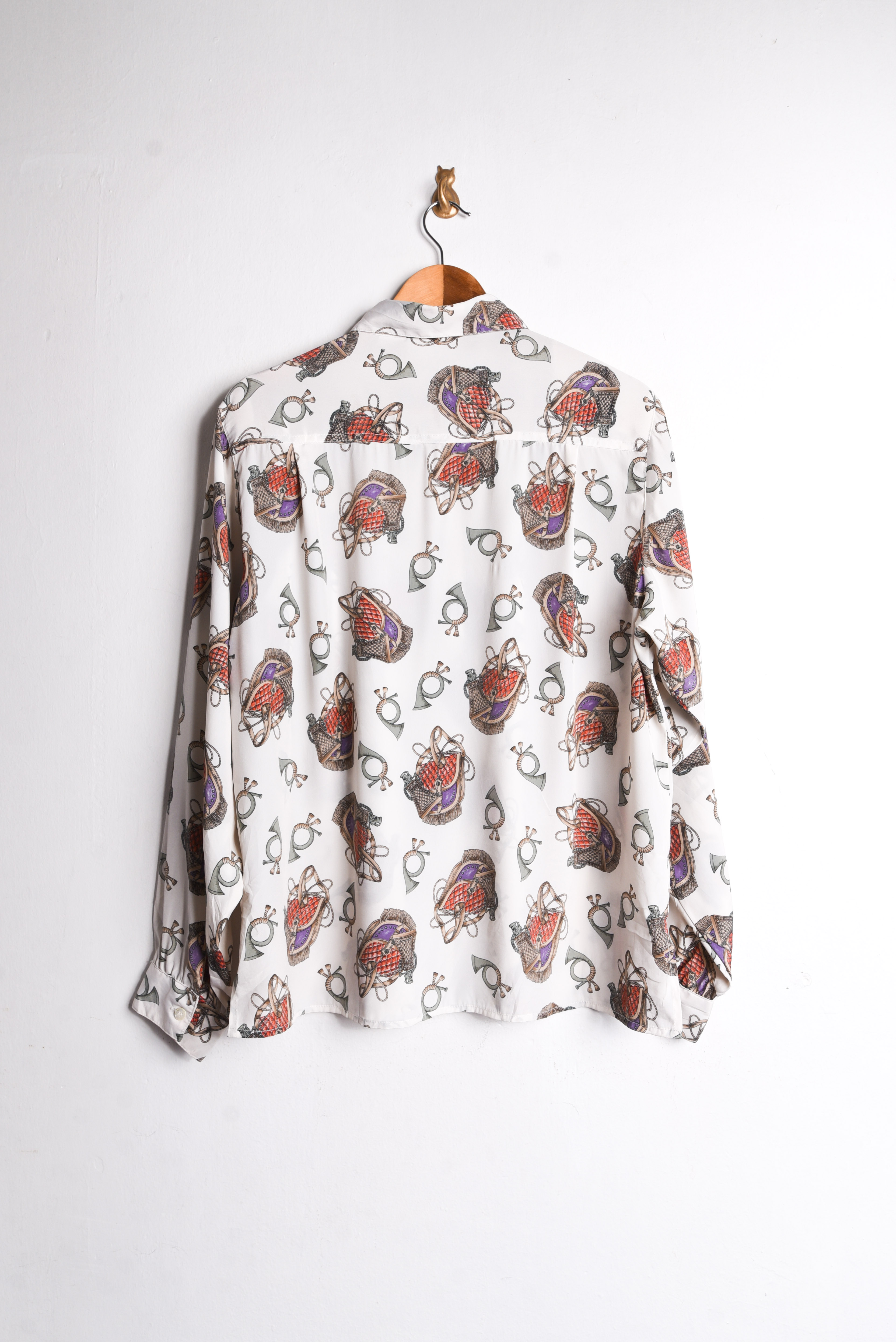Blusa vintage print trompetas
