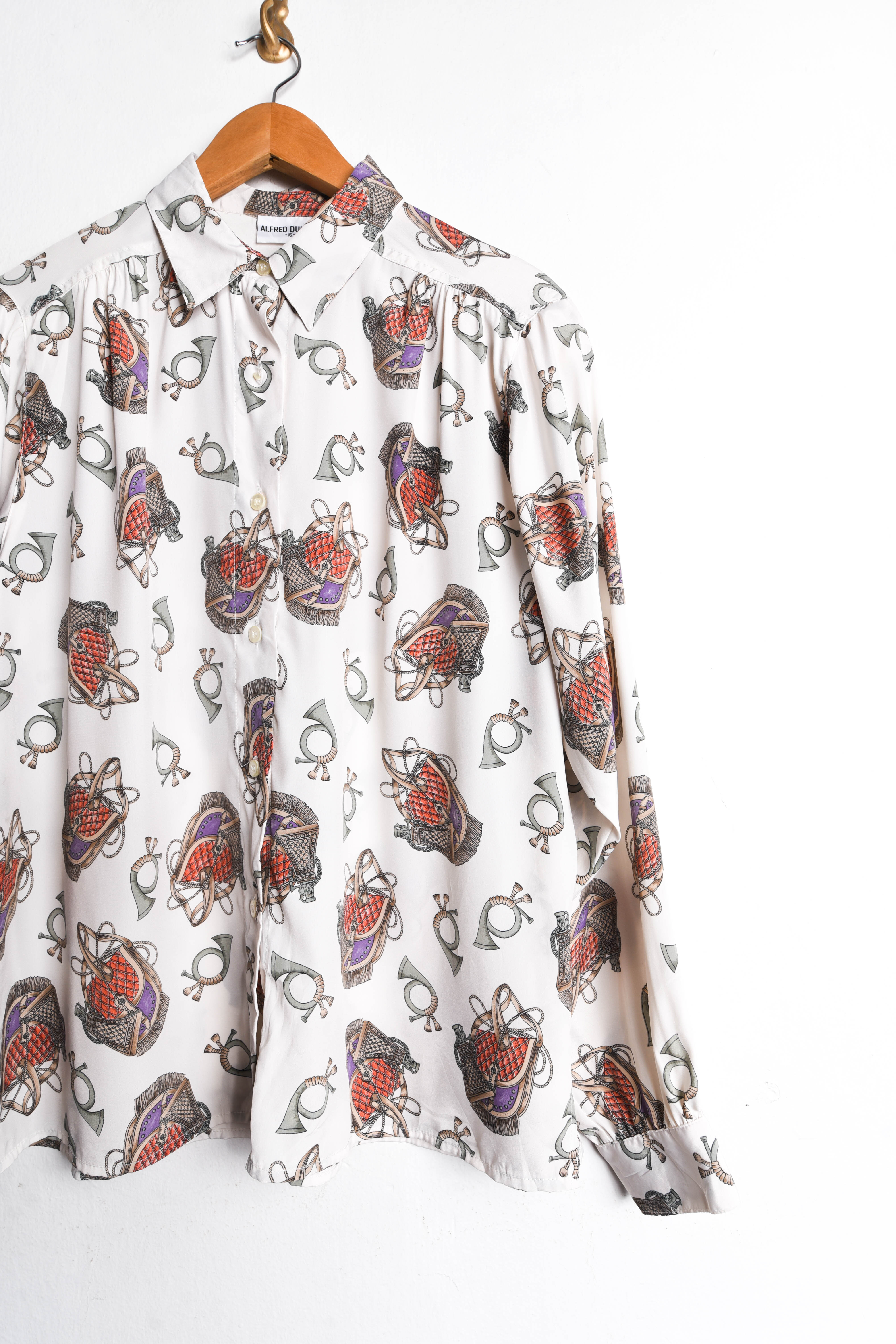 Blusa vintage print trompetas