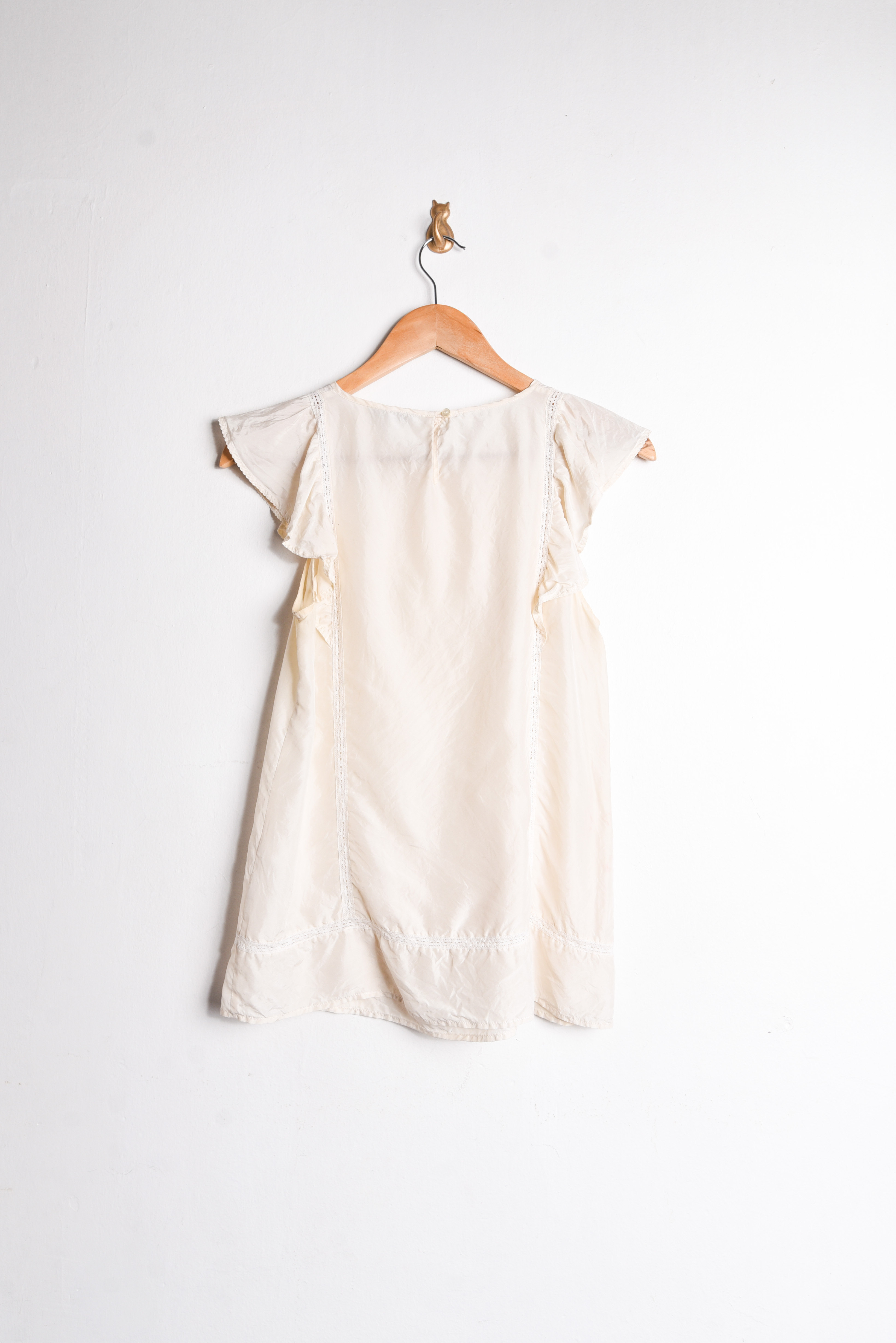 Blusa marfil seda vuelos