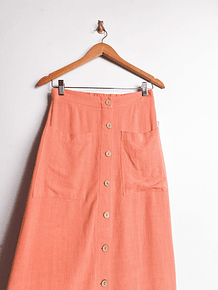 Falda naranja botones