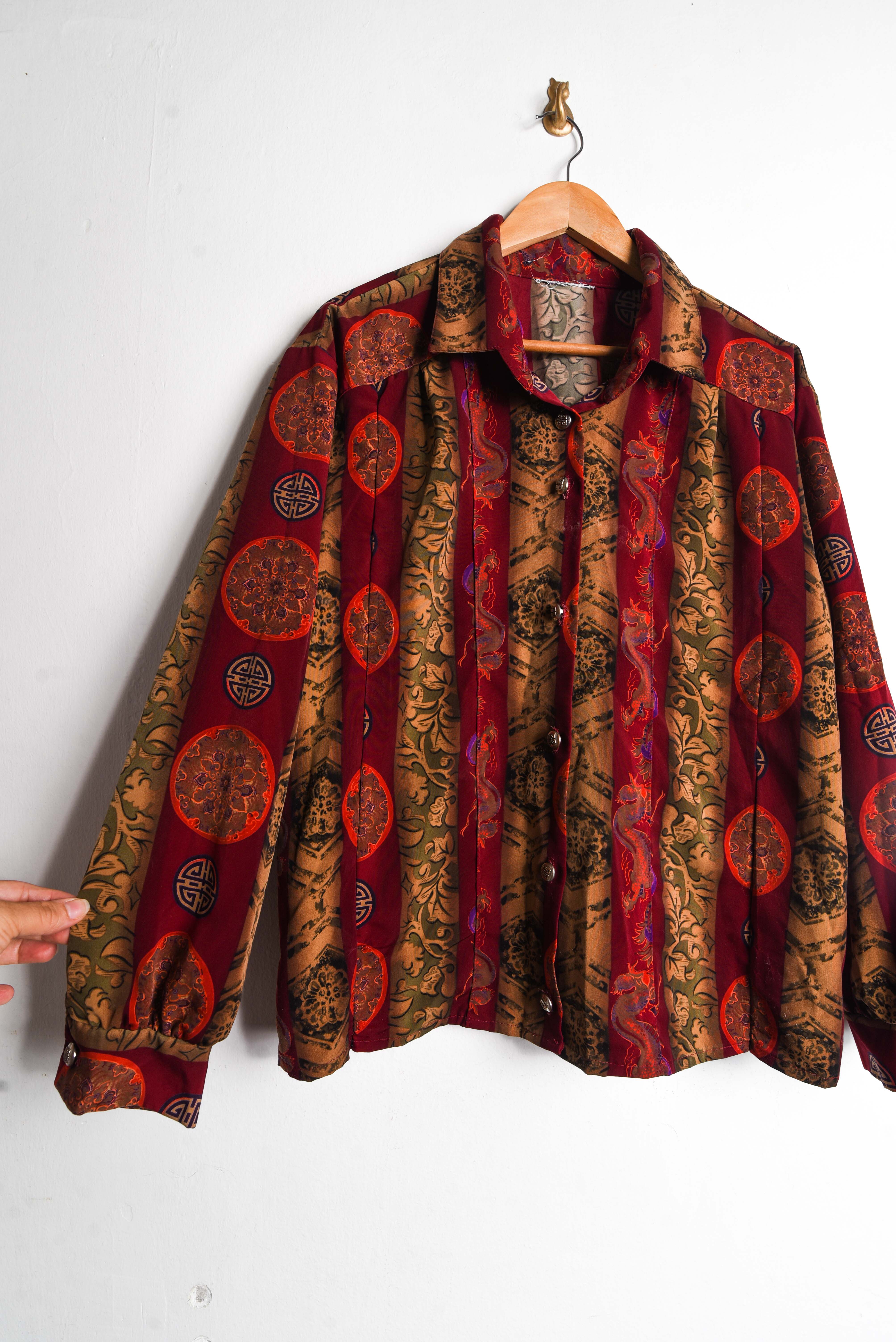 Blusa rojo ladrillo dragones