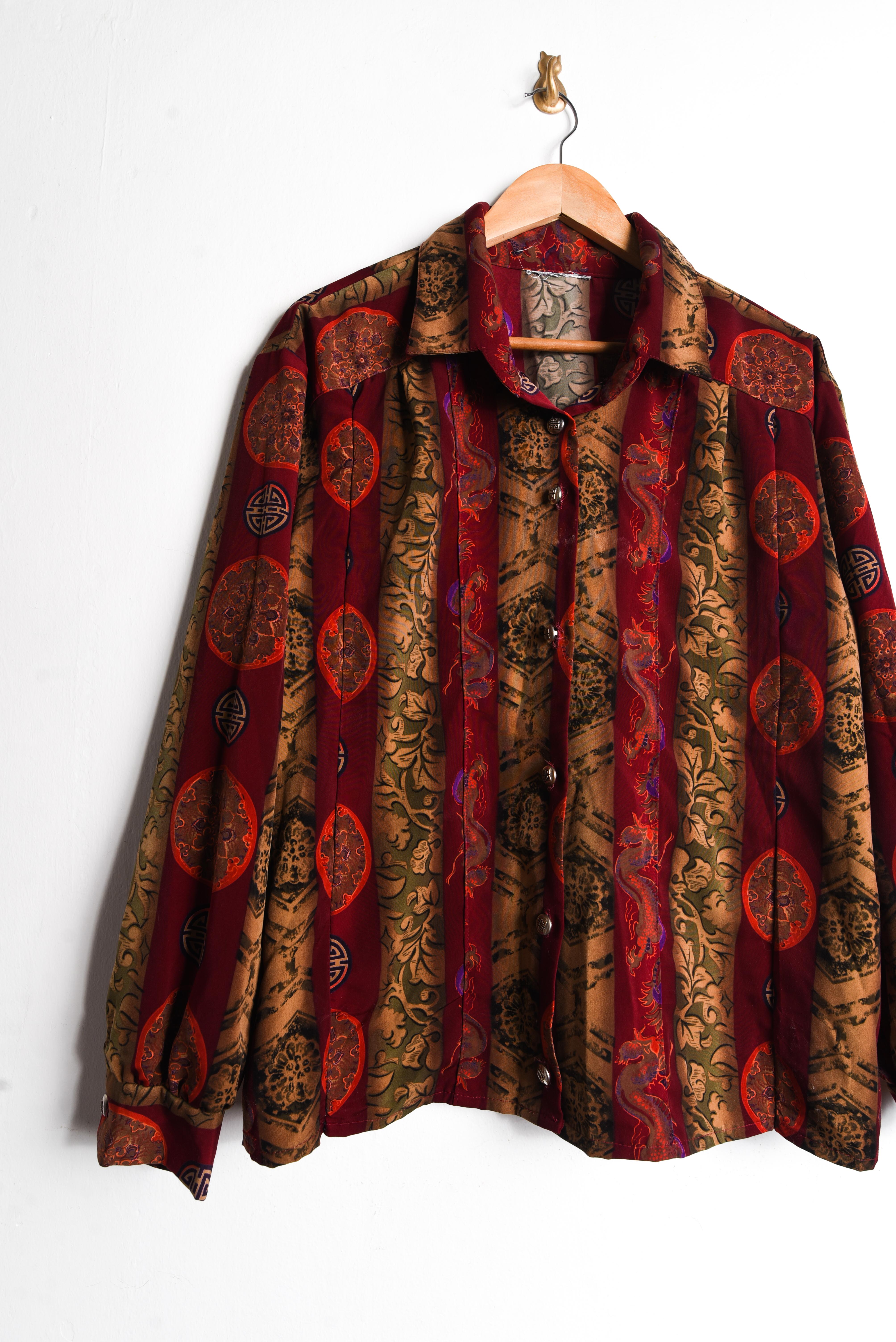 Blusa rojo ladrillo dragones