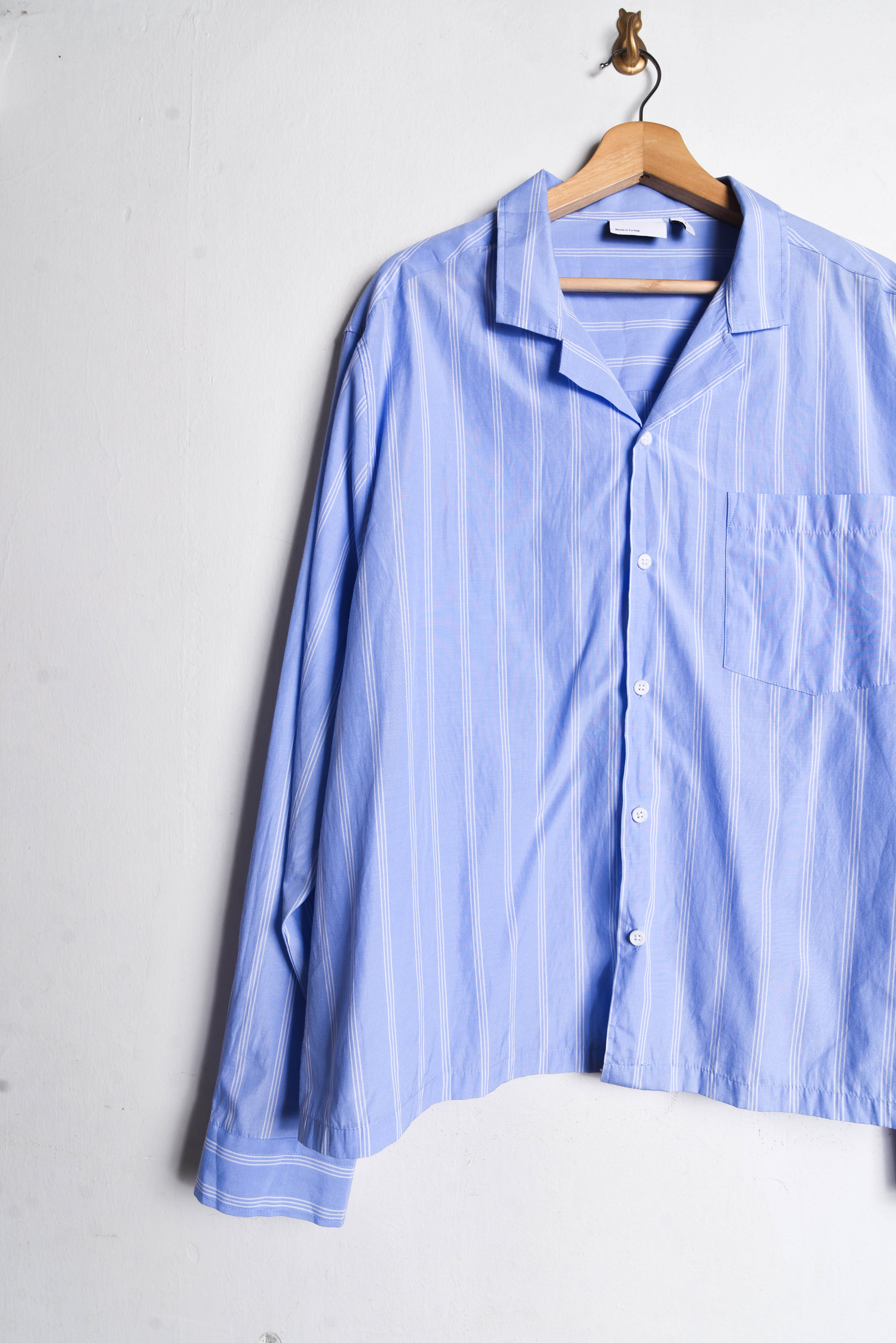 Camisa celeste rayada plus size