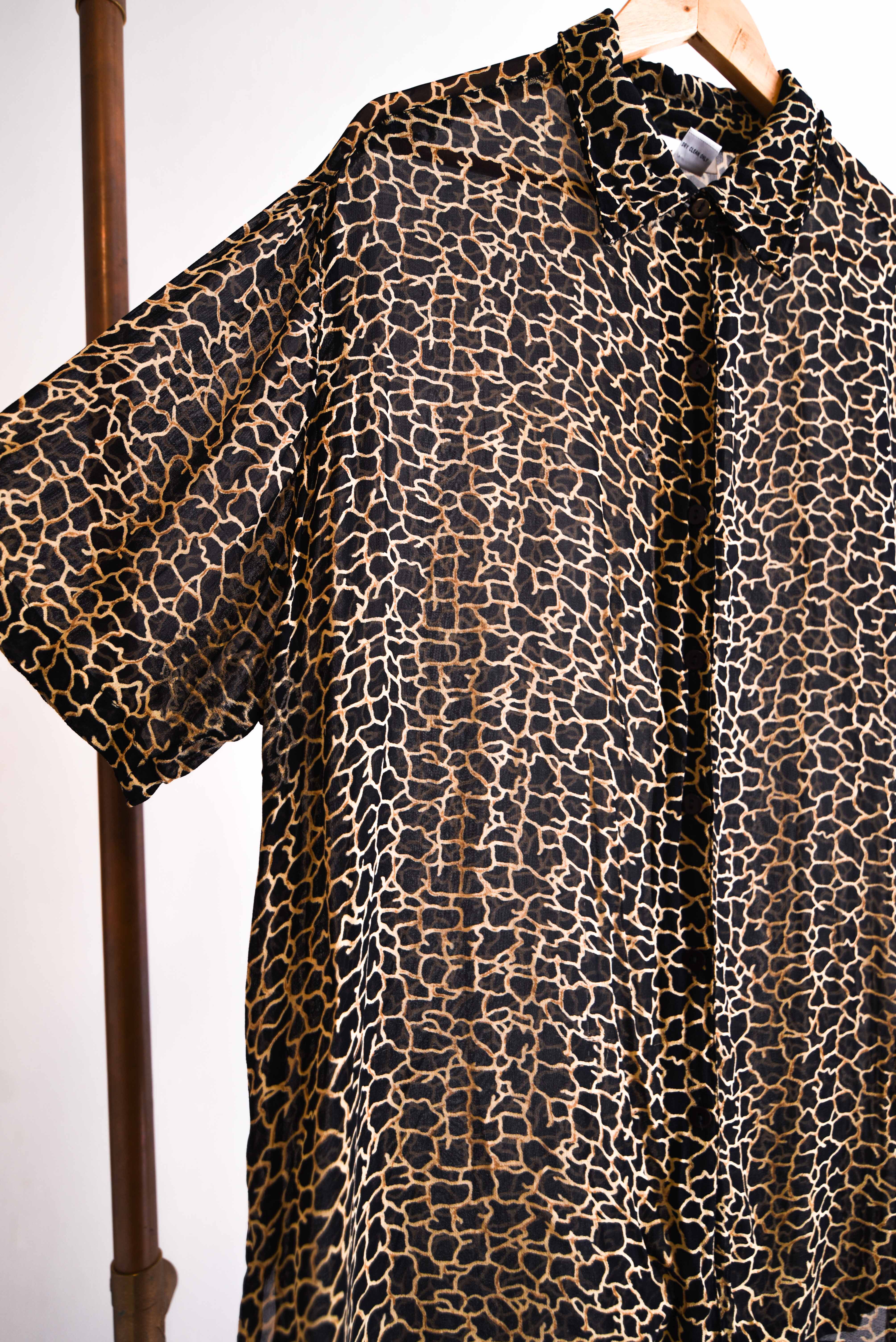 Blusa transparencia giraffe print