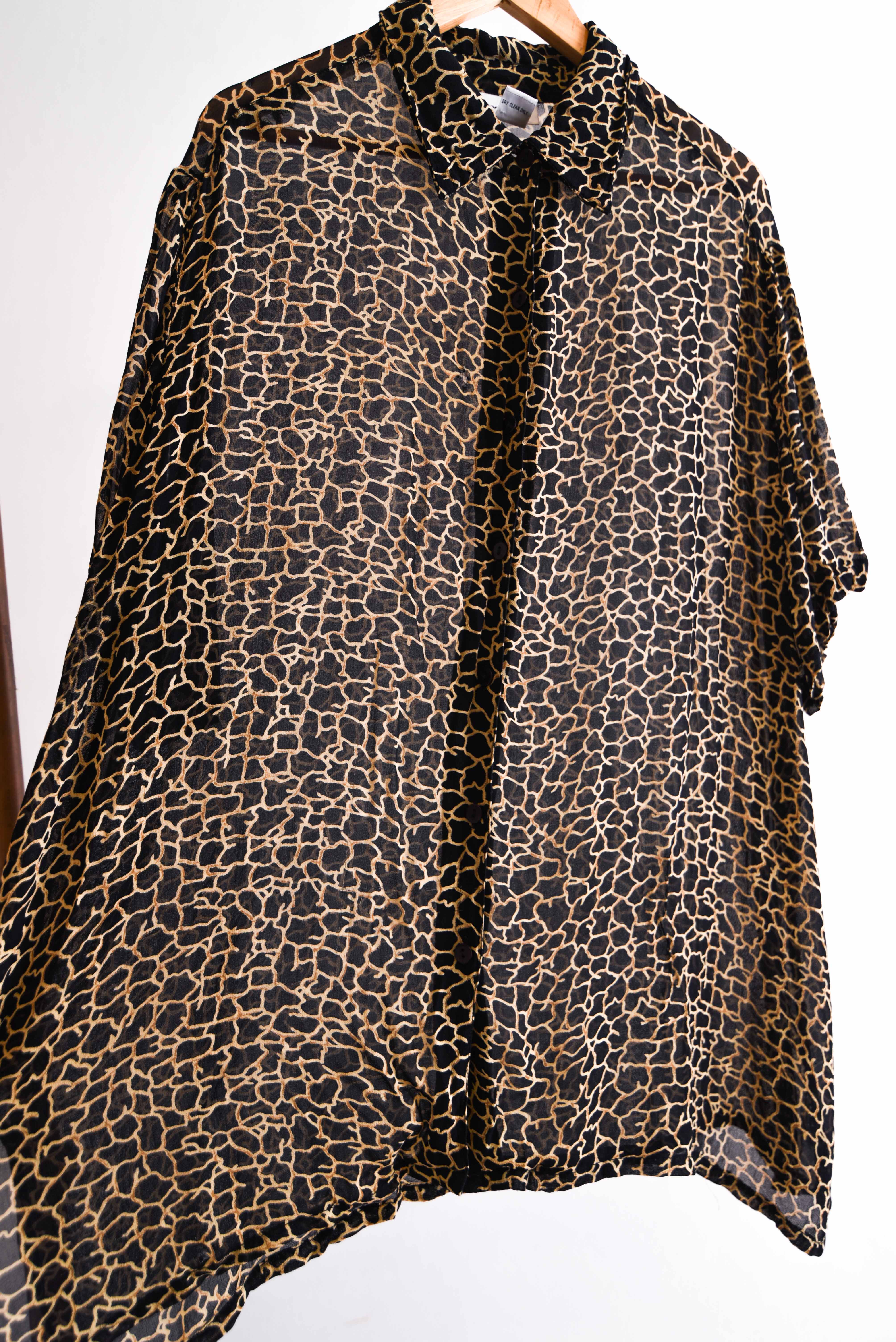 Blusa transparencia giraffe print