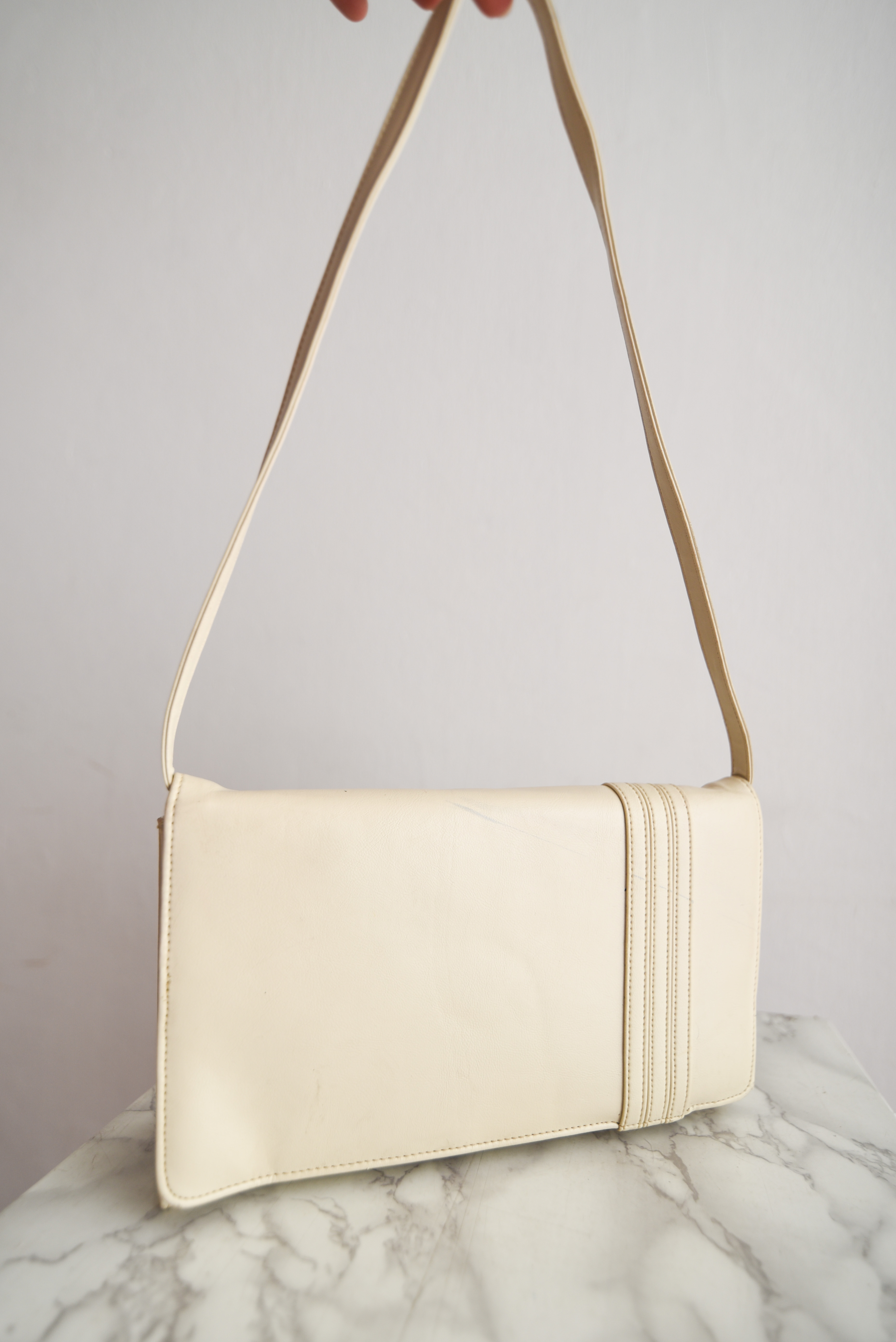 Cartera marfil 70s