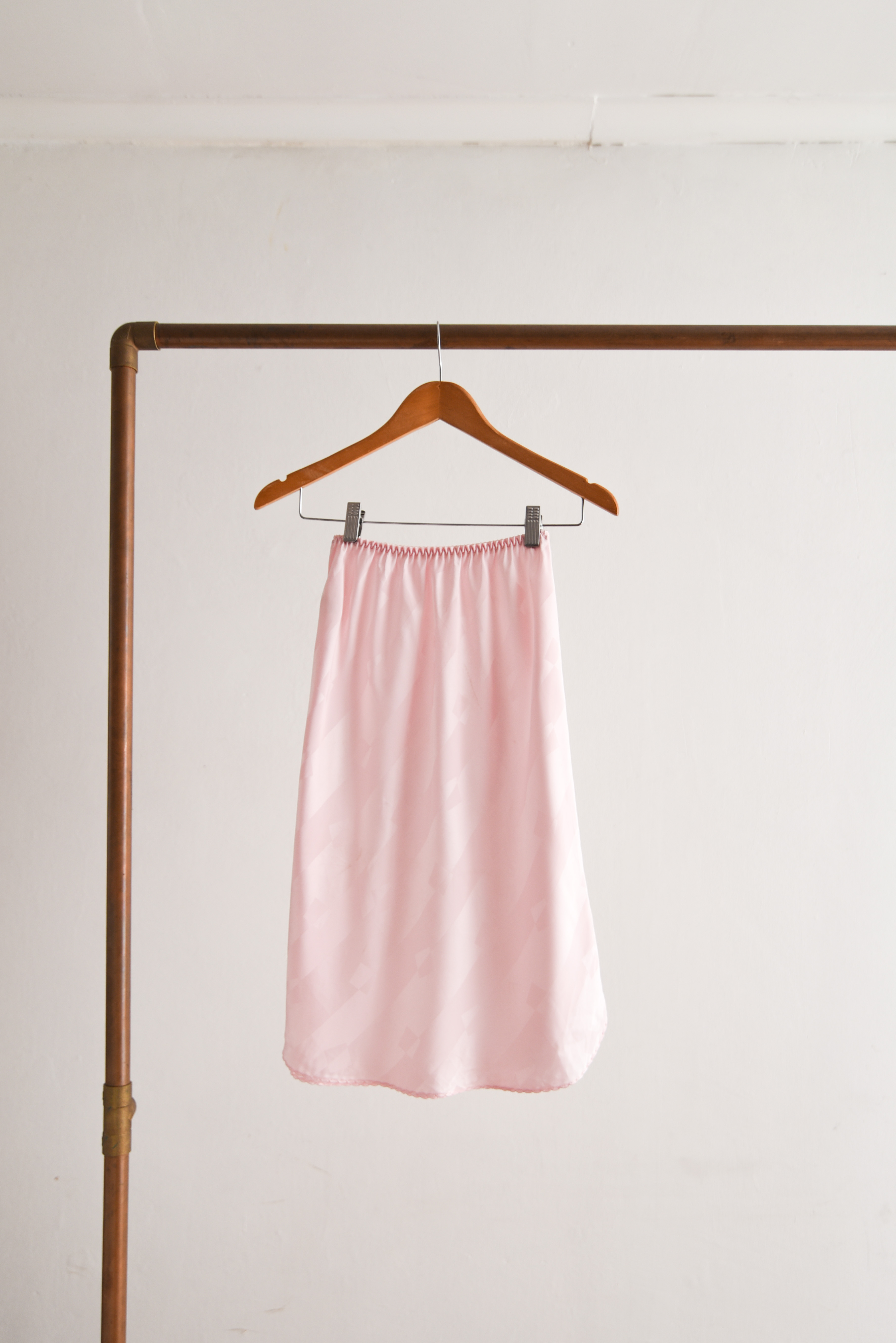 Falda lencera rosa pastel