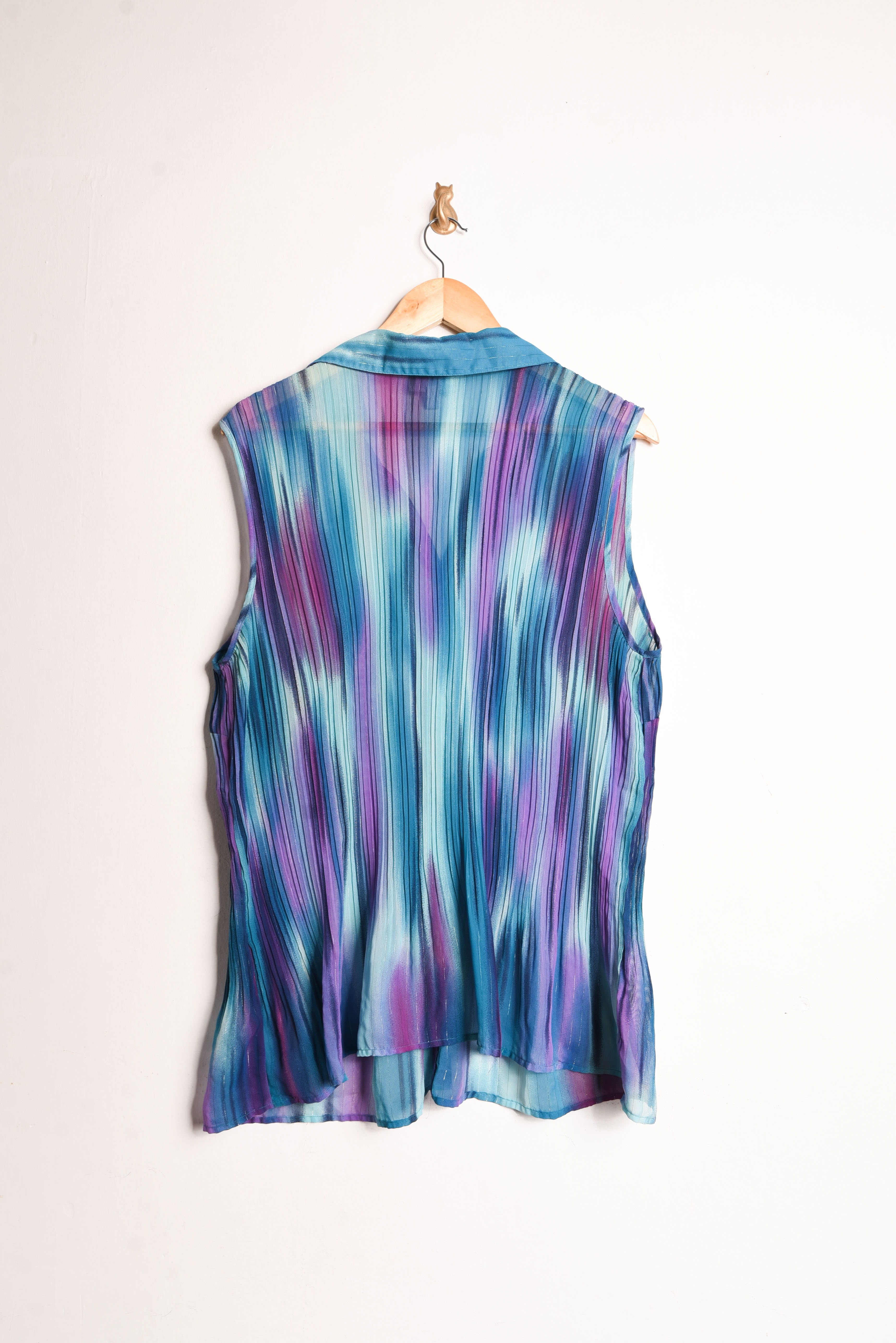 Blusa plisada turquesa