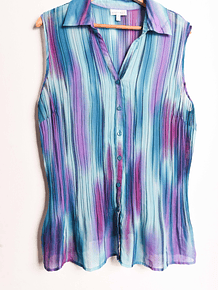 Blusa plisada turquesa