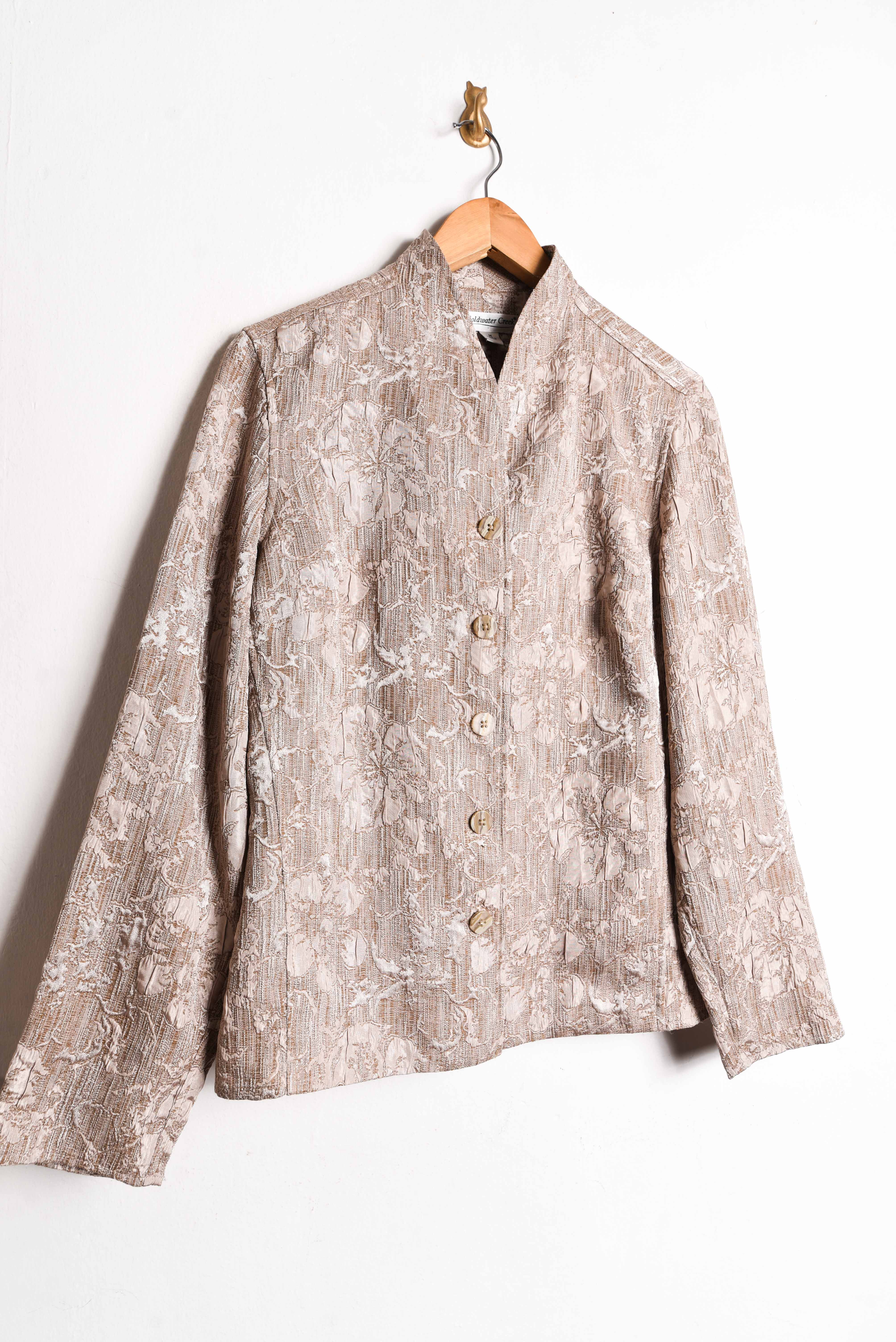 Chaqueta beige texturada