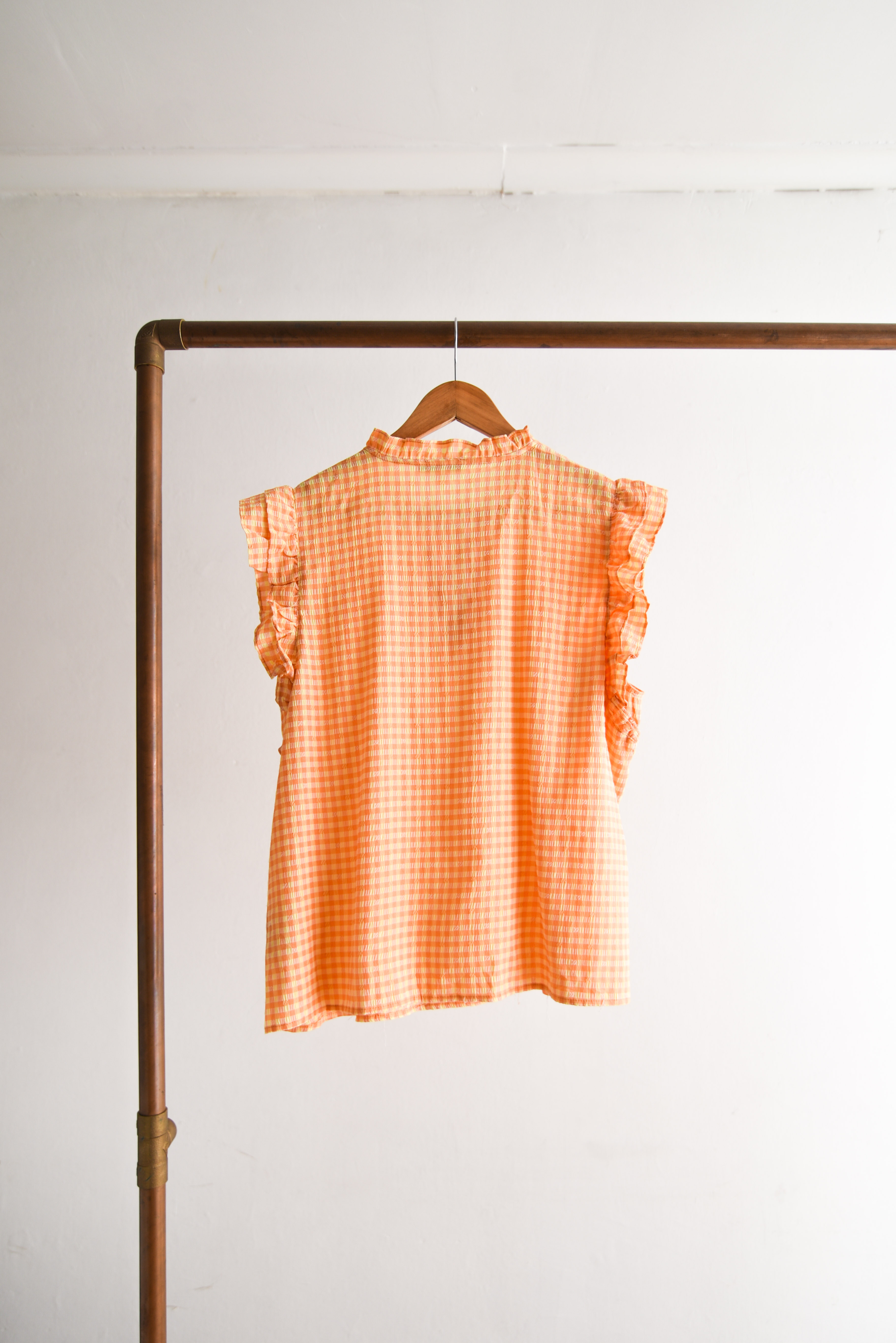 Blusa gingham naranja vuelos