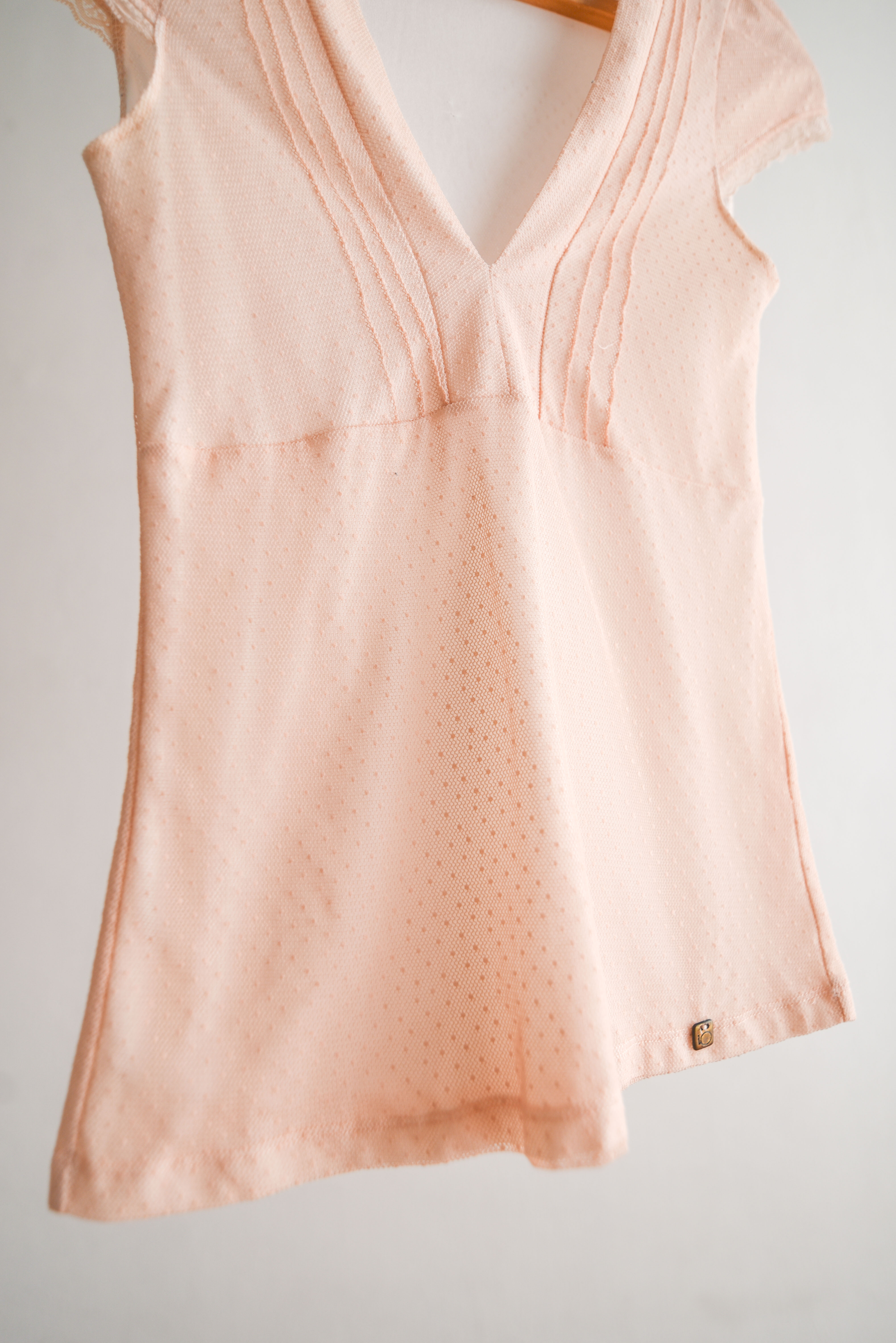 Top rosa pastel mesh
