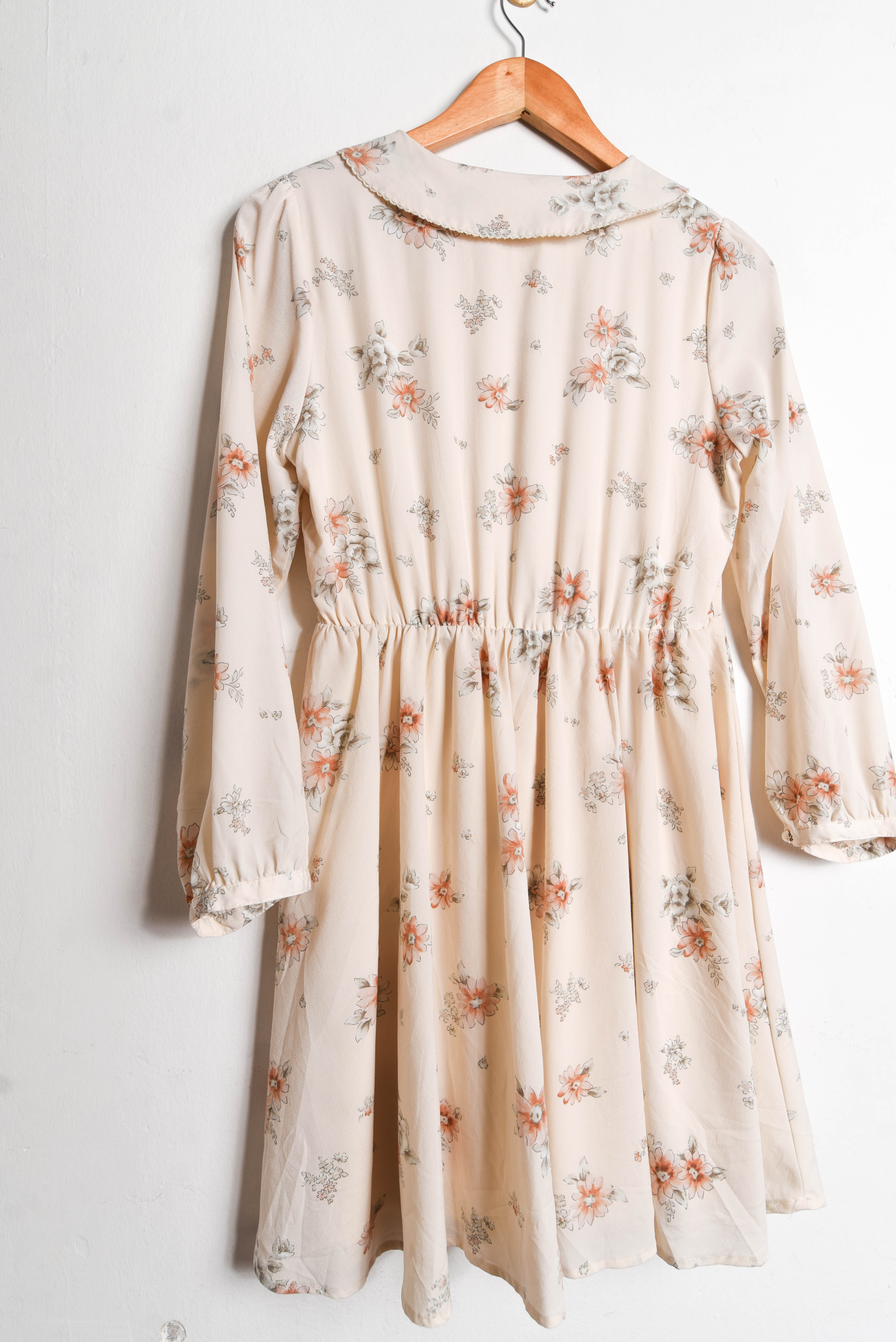 Vestido marfil cuello bebe