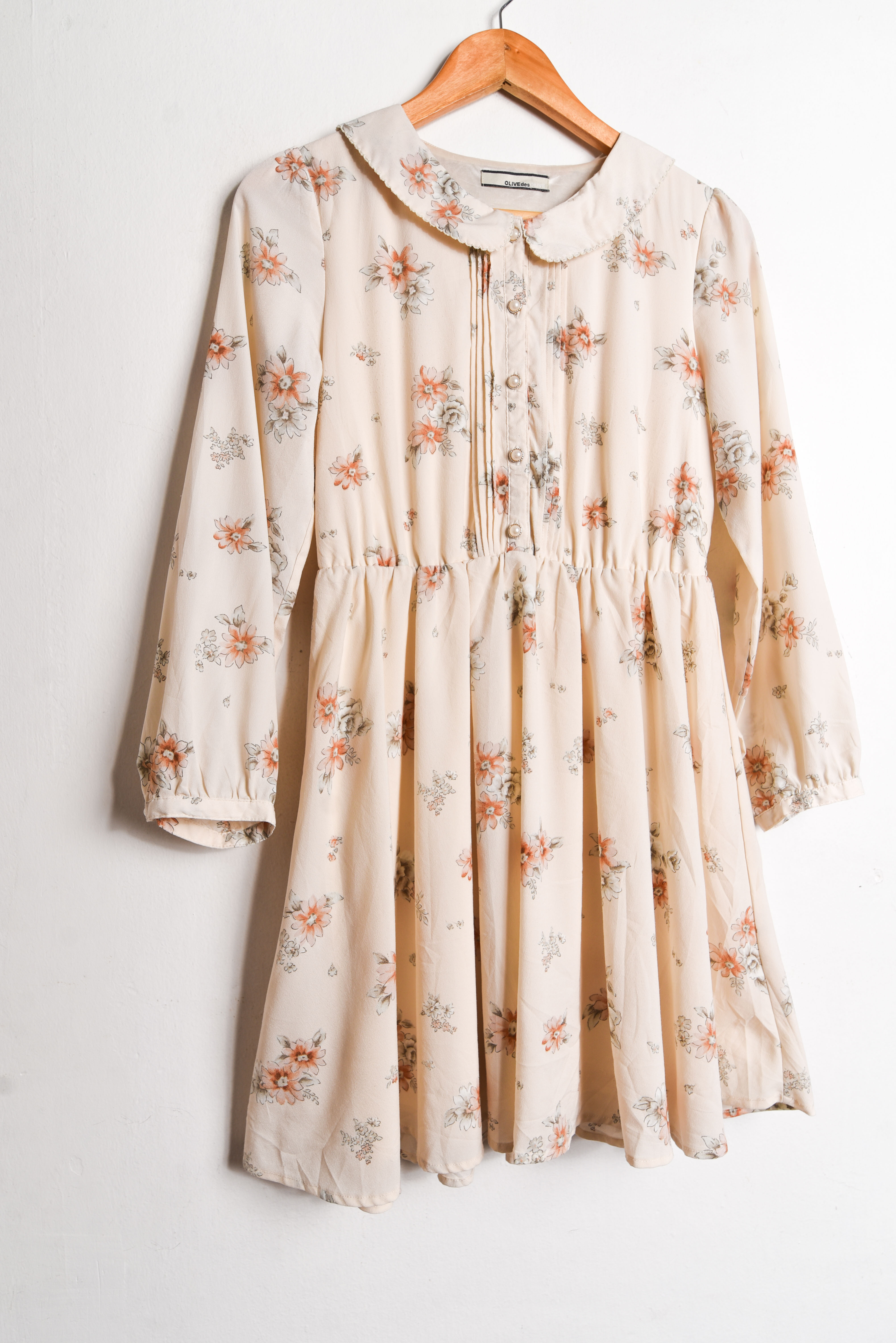 Vestido marfil cuello bebe